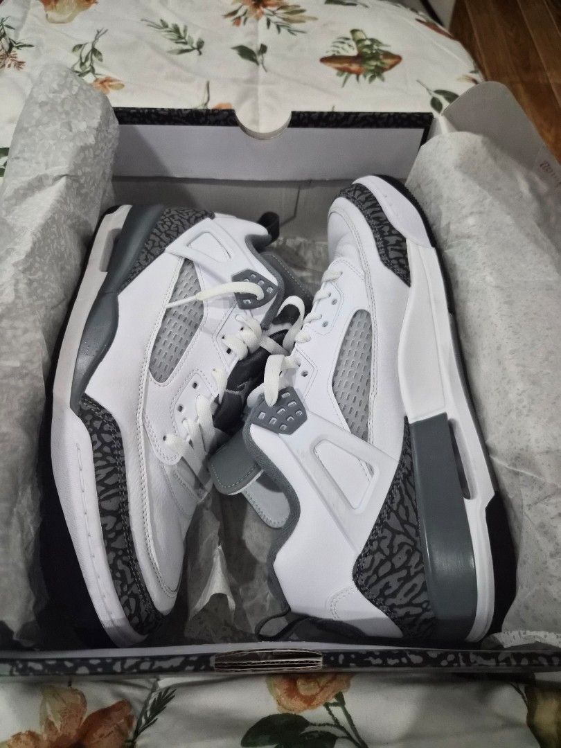 Nike Jordan Spizike Low - White/Grey (Category: Sneakers) located in Taguig. Submitted by brightwind_b935b1 (Listing ID 1434323978, Image 2). Description: - Authentic Nike Jordan Spizike Low sneakers - White and grey color scheme - Features iconic elephant print - Size: US 11 - Includes original box - Jordan logo visible on soles - Perfect for sneaker collectors Used twice Negotiable. Rfs - too many shoes. Need funds .