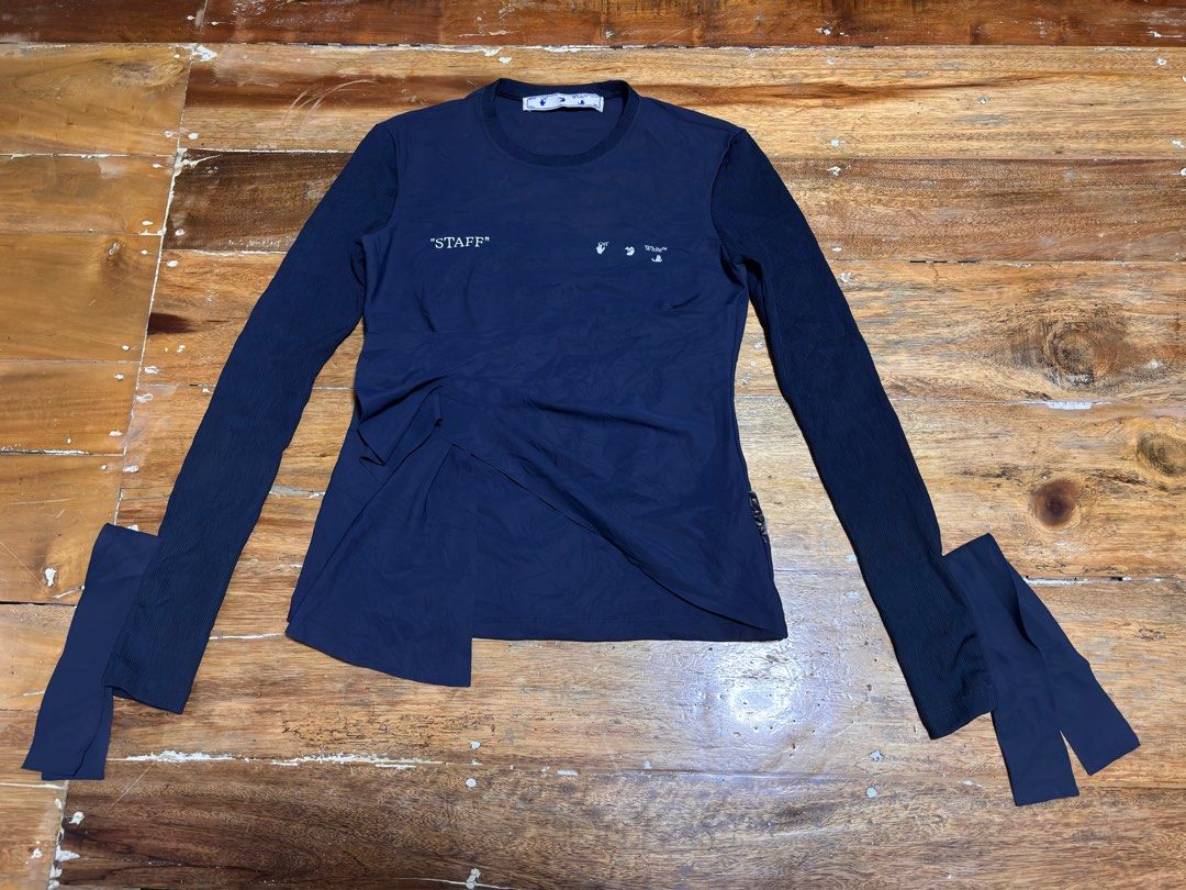Off-White Staff Garment Long Sleeve Shirt (Category: Tshirts & Polo Shirts ) located in Cagayan de Oro. Submitted by kirkwax_4 (Listing ID 1434271617, Image 1). Description: - Off-White long sleeve shirt Authentic Small/medium frame (16.5x22.5) - Color: Navy blue - Front: "STAFF" print - Back: "OFF-WHITE STAFF GARMENT" with "©2013" - Features the Off-White logo on the label - Unique design and fabric details 2k.