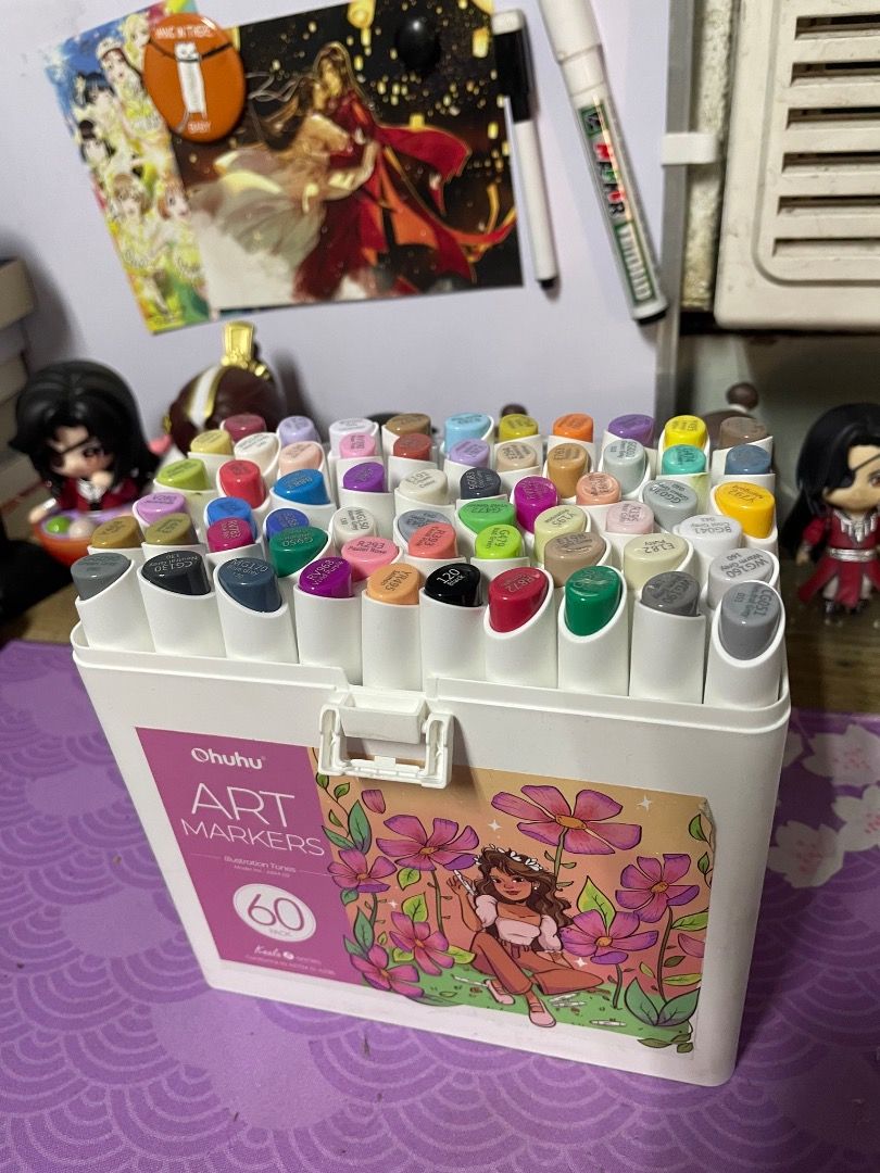 Ohuhu Markers 60 Colors (Category: Stationery & School Supplies) located in Quezon City. Submitted by tennshiii (Listing ID 1434385278, Image 1). Description: - Ohuhu 60-color art marker set - Kaala B series - Dual-tip design: brush and chisel tips - Ideal for diverse art projects.