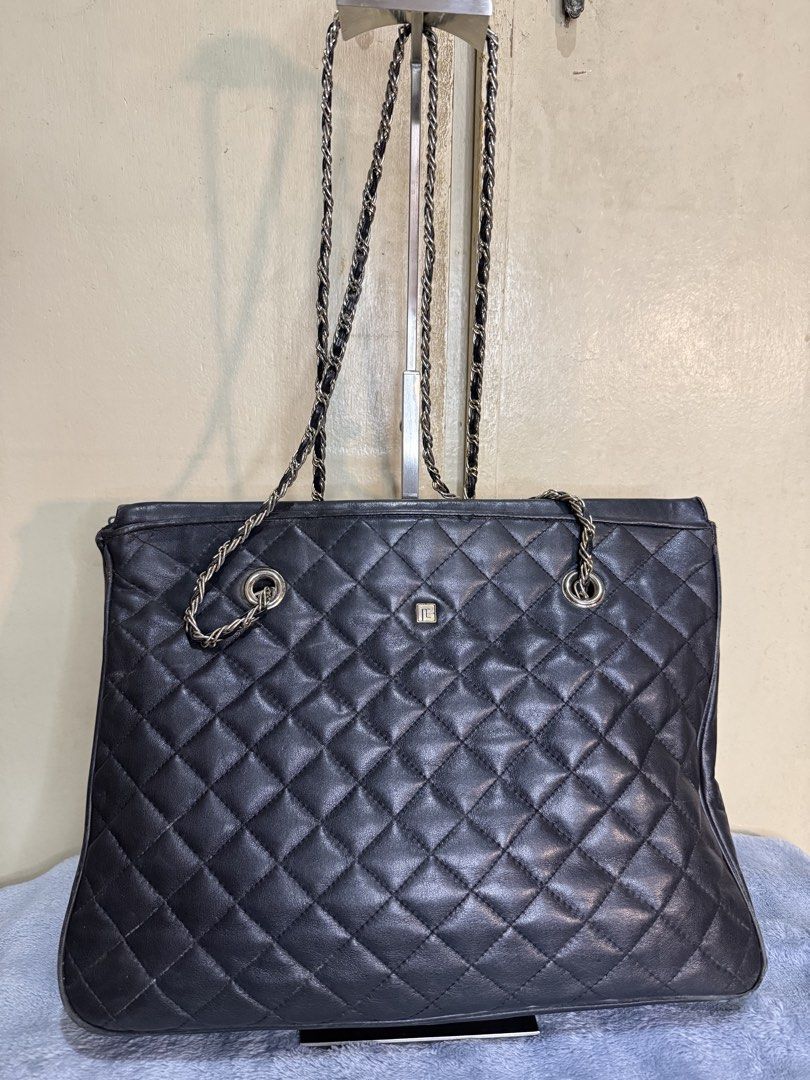 Pie*rre Bal*main Quilted Tote Bag (Category: Luxury Bags & Wallets) located in Caloocan City. Submitted by paterf (Listing ID 1434218688, Image 2). Description: • Black quilted genuine lambskin leather with light gold hardwares • Vintage • Made in France • Size: L • Measurements: 14” L x 3” W x 11” H • Heavy used but still in good condition with signs of wear & storage • K&K zip • Uncoded • Flaws/issues: leather rubs, 1 open piping, dirt marks, t