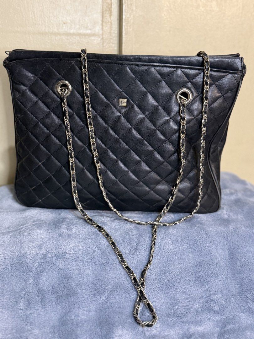 Pie*rre Bal*main Quilted Tote Bag (Category: Luxury Bags & Wallets) located in Caloocan City. Submitted by paterf (Listing ID 1434218688, Image 1). Description: • Black quilted genuine lambskin leather with light gold hardwares • Vintage • Made in France • Size: L • Measurements: 14” L x 3” W x 11” H • Heavy used but still in good condition with signs of wear & storage • K&K zip • Uncoded • Flaws/issues: leather rubs, 1 open piping, dirt marks, t