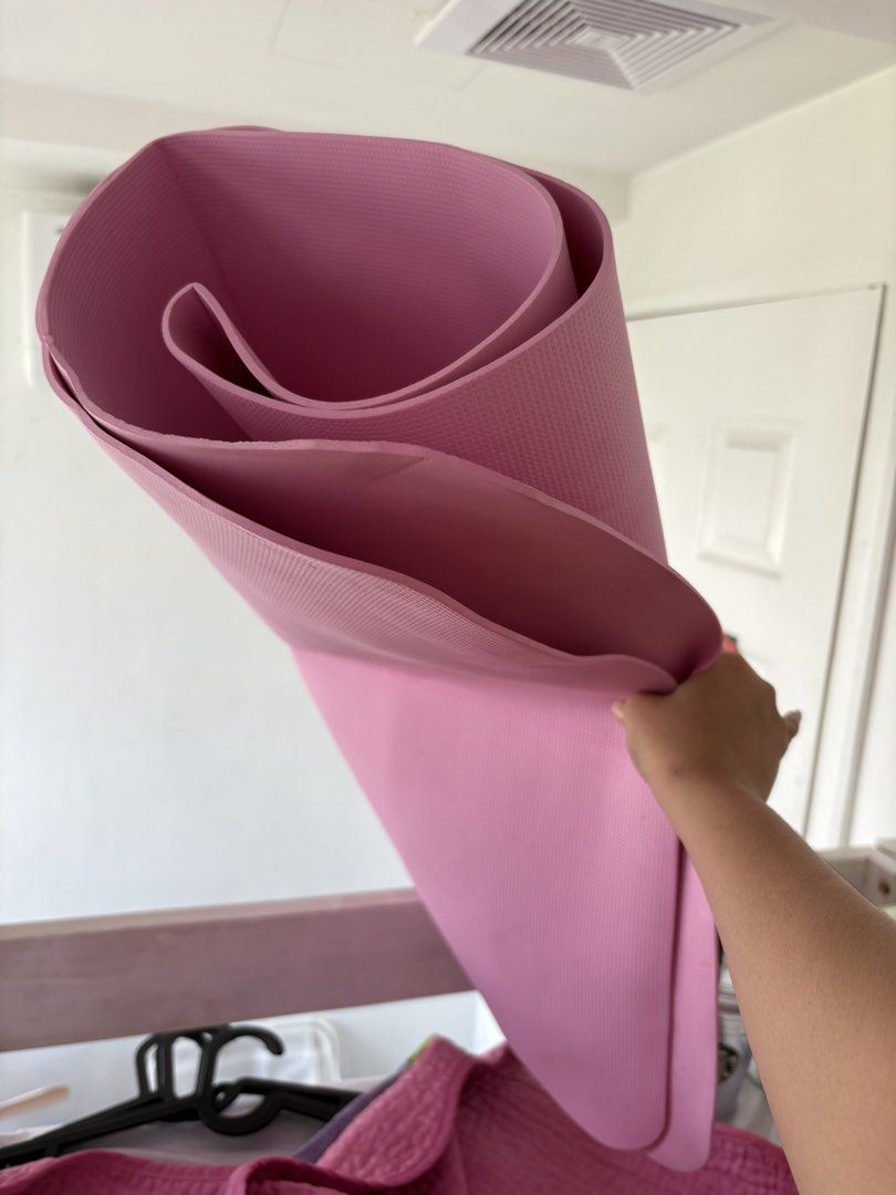 Pink Yoga Mat (Category: Exercise Mats) located in Quezon City. Submitted by mycloset_28 (Listing ID 1434248640, Image 1). Description: - Pink yoga mat - Durable, textured material - Subtle grip pattern - Easy to roll up and store - Ideal for home workouts.
