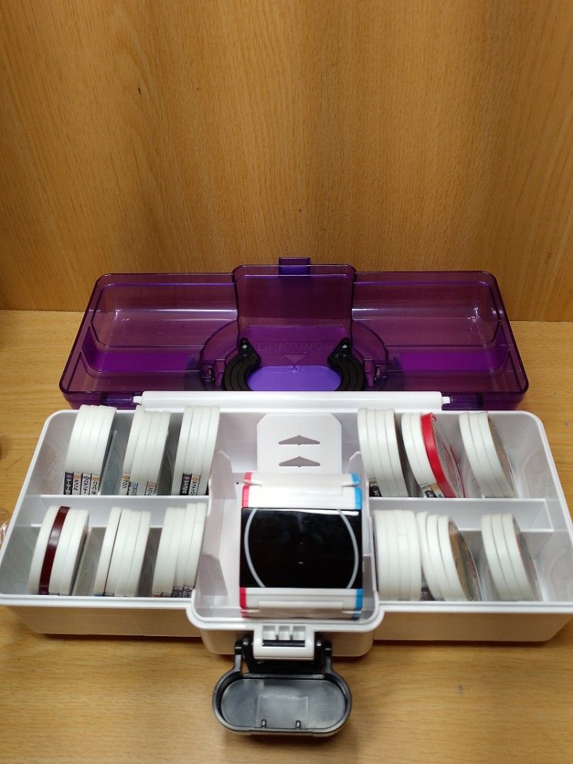 Pokemon Monster megastar trunk (Category: Storage Boxes & Baskets) located in Davao. Submitted by washerjeni08452 (Listing ID 1434314987, Image 1). Description: - Pokemon Master storage box - Multiple compartments for storage - Includes a watch-like device with blue and red accents - Comes with several rolls of white tape - Box color: Purple and white - Features a handle for easy carrying - Clear lid for visibility - Secure latch closure selling 