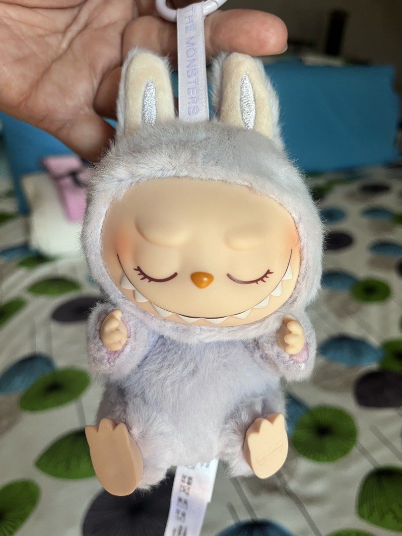 Pop Mart The Monsters Labubu Keychain (Category: Designer & Blind Box Toys) located in Cainta. Submitted by llsamson2000 (Listing ID 1434183519, Image 2). Description: - Pop Mart The Monsters Labubu keychain - Features a cute Labubu character in a bunny suit - Includes a keychain ring for easy attachment - Made with soft, huggable plush material - Ideal for collectors and cute accessory lovers.