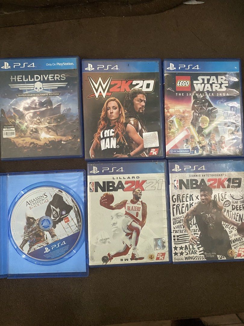 PS4 Games (for sale/read description) (Category: PlayStation) located in Noveleta. Submitted by king_niko_szn (Listing ID 1434249113, Image 1). Description: NBA 2k19 - 280 WWE 2k20 - 220 (SOLD) NBA 2k21 - 350 Assasins Creed Black Flag (in a WWE 2k16 case) - 500 Helldivers Ultimate Edition - 500 Lego Star Wars Skywalker Saga - 850 All - 2,500/Negotiable pag all Sagot niyo po Shipping Fee Mode of Payment - Gcash Courier - J&T .