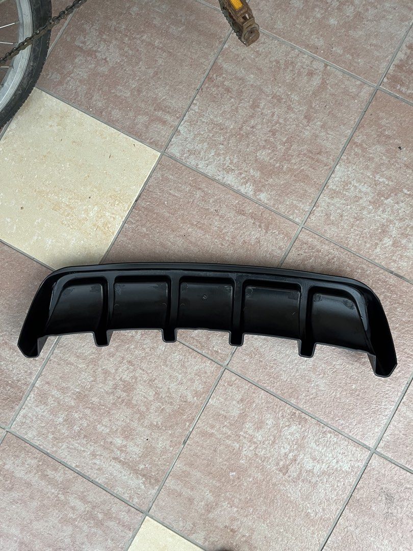 Rear Diffuser (Category: Bodykits & Styling) located in Singapore. Submitted by ja2011 (Listing ID 1434229641, Image 2). Description: Brand new rear diffuser for cars / vans. Never used before. Refer to 3rd picture for a reference on how it can fit your ride .