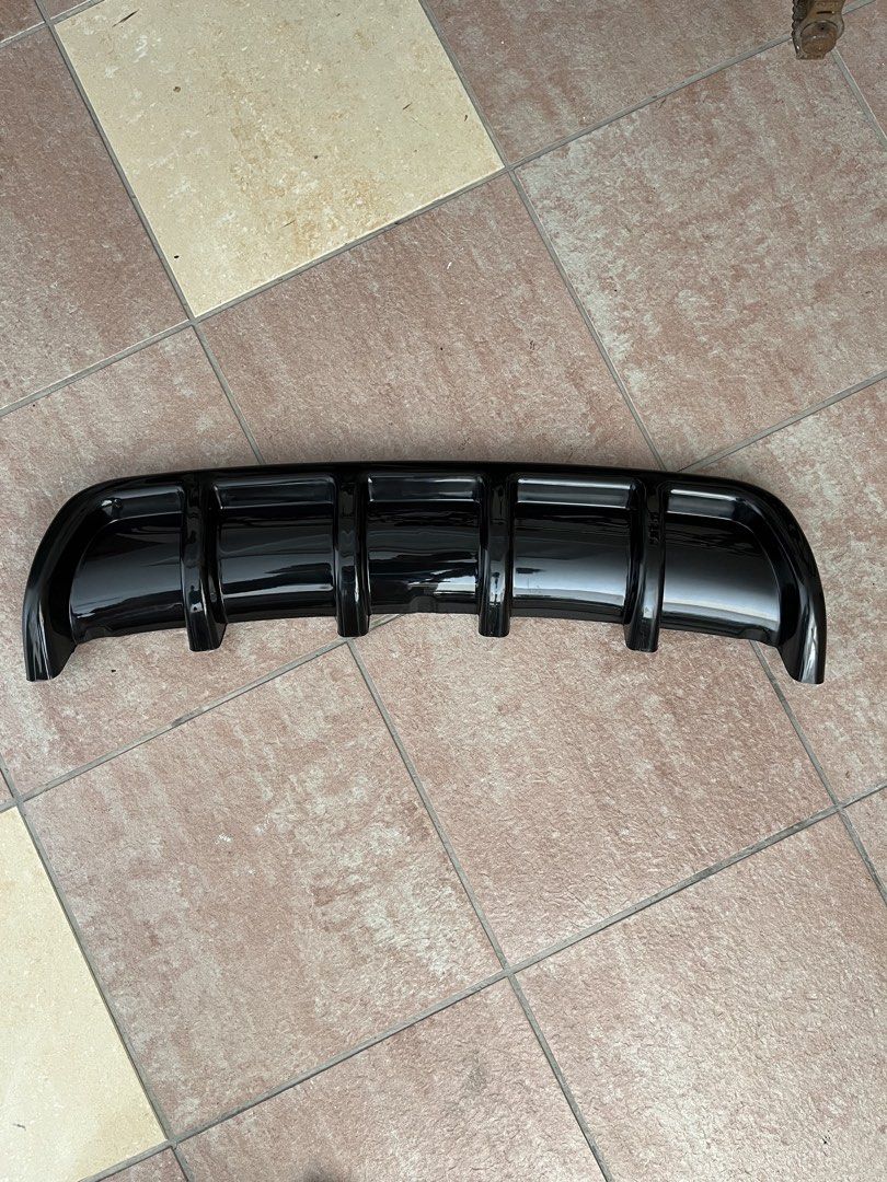 Rear Diffuser (Category: Bodykits & Styling) located in Singapore. Submitted by ja2011 (Listing ID 1434229641, Image 1). Description: Brand new rear diffuser for cars / vans. Never used before. Refer to 3rd picture for a reference on how it can fit your ride .