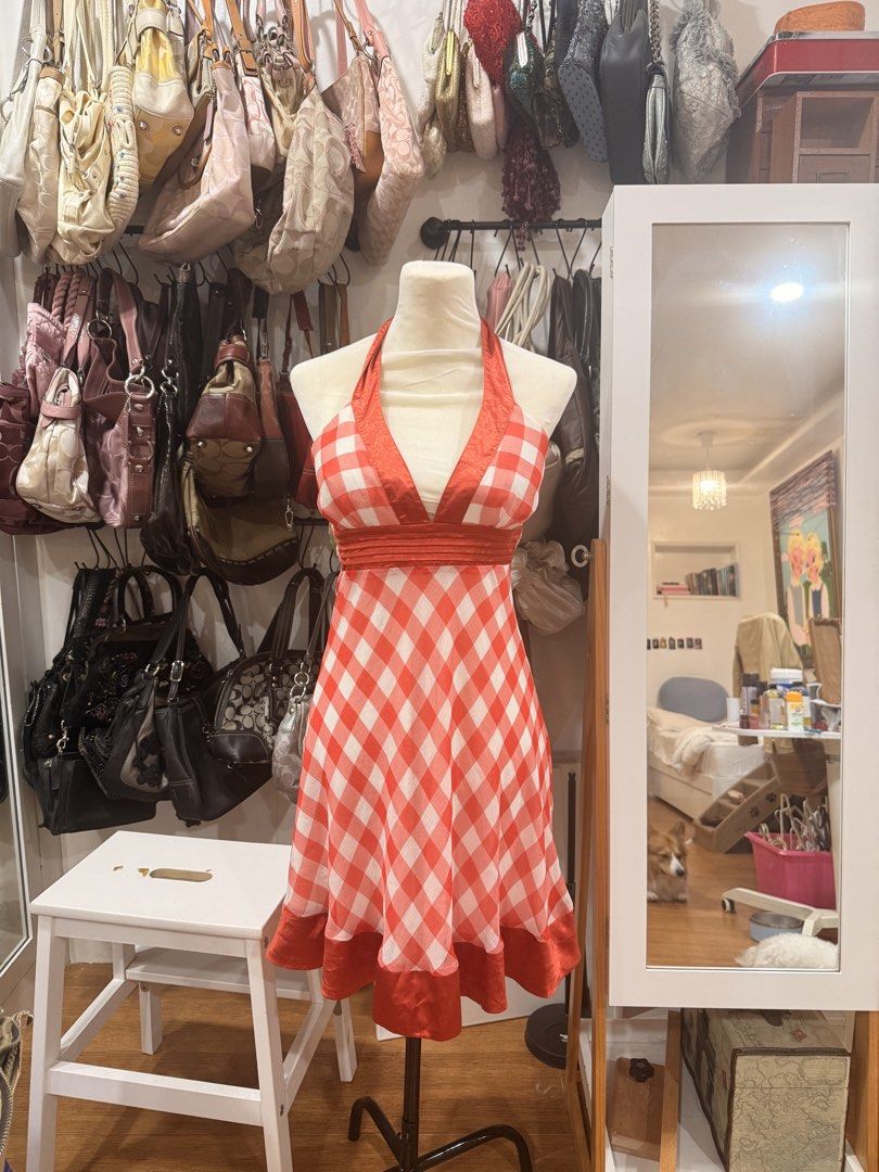 Red and White Checkered Halter Dress (Category: Dresses) located in Cainta. Submitted by kitskit (Listing ID 1434326818, Image 1). Description: - Halter neckline - Red and white checkered pattern - Fitted bodice - Flared skirt with red hem trim - Ideal for summer outings and casual events.