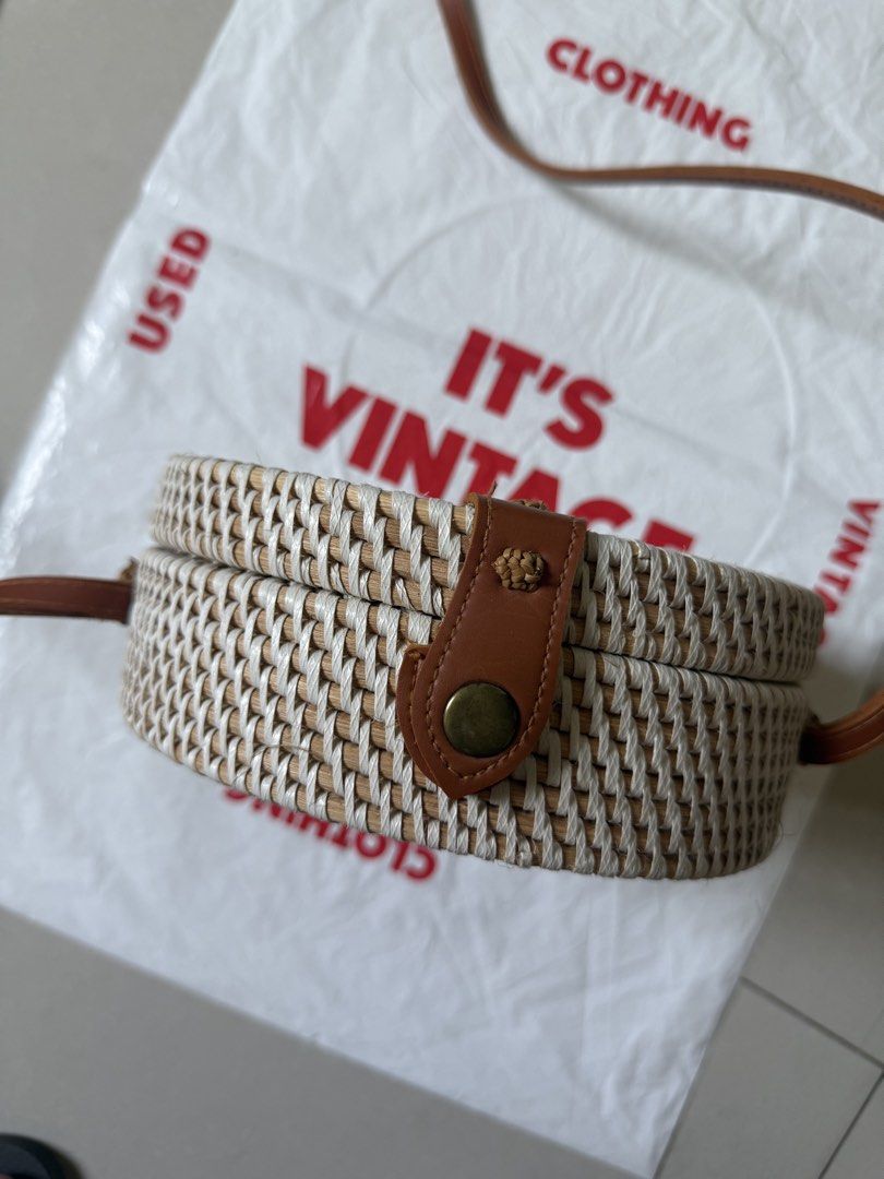 Round Woven (Rattan) Bag with Leather Strap (Category: Cross-body Bags) located in Manila. Submitted by riceloved (Listing ID 1434264622, Image 2). Description: Perfect for the beach :) RFS: Decluttering - Woven round bag - Leather strap - Clasp closure.