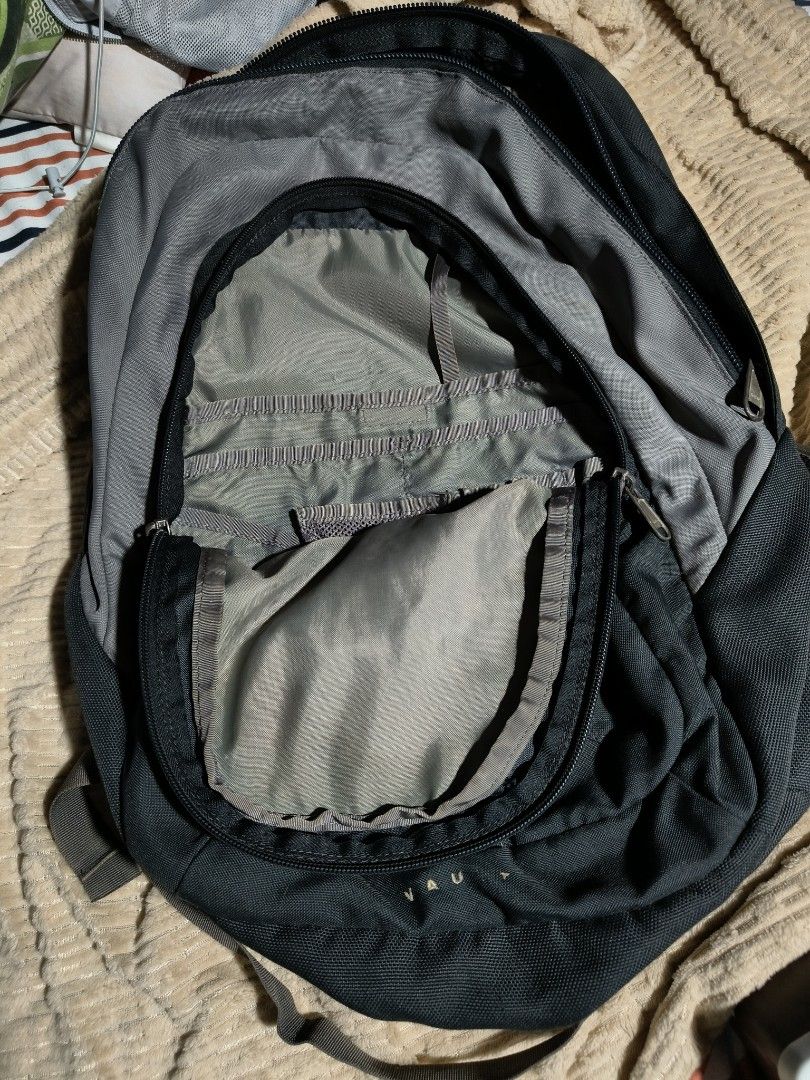 The North Face Vault Backpack (Category: Backpacks) located in Quezon City. Submitted by bagsareus428 (Listing ID 1434285019, Image 3). Description: - The North Face Vault backpack. - Color: Black and Gray. with watermark sticker in tag - Main compartment for storage. - Front pocket for essentials. - Padded shoulder straps for comfort. - Padded back panel. - Chest strap with buckle closure. - Top handle for easy carrying. - Made in Vietnam..