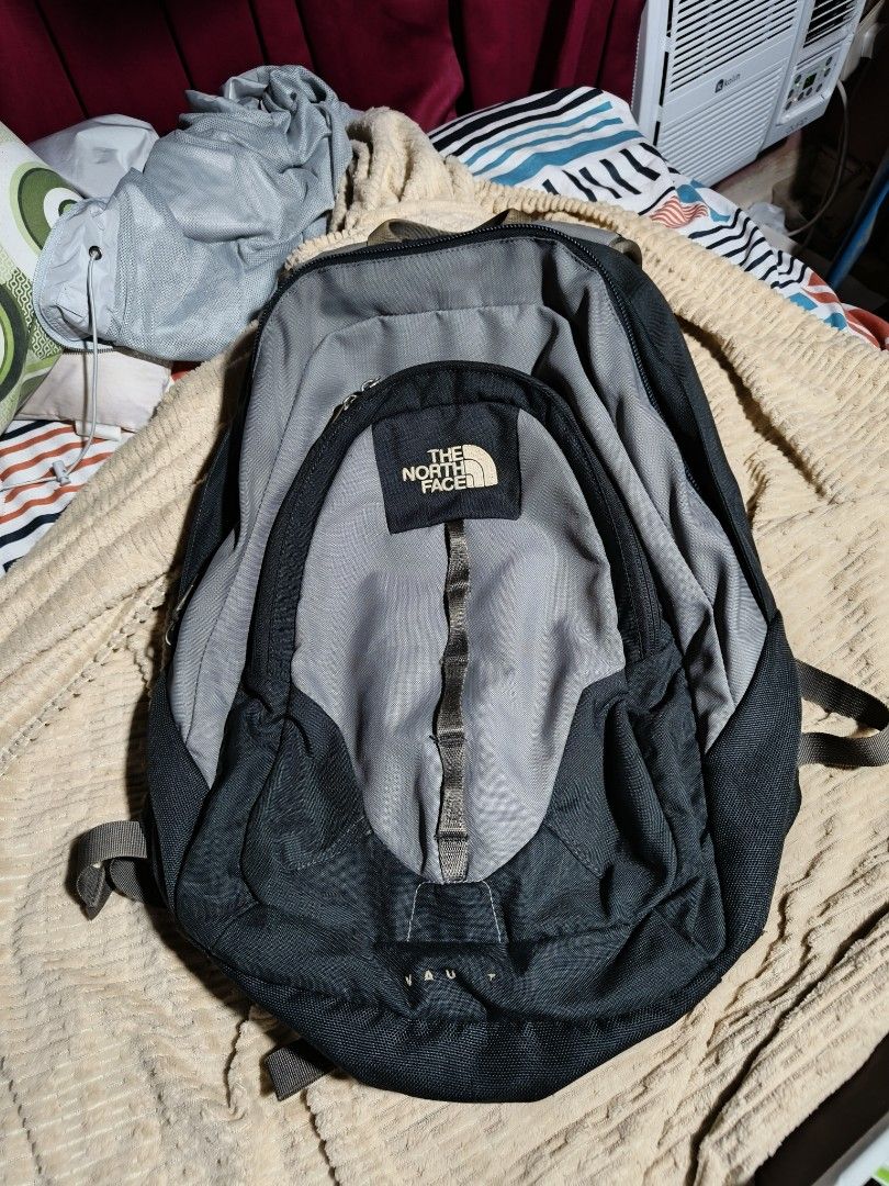 The North Face Vault Backpack (Category: Backpacks) located in Quezon City. Submitted by bagsareus428 (Listing ID 1434285019, Image 1). Description: - The North Face Vault backpack. - Color: Black and Gray. with watermark sticker in tag - Main compartment for storage. - Front pocket for essentials. - Padded shoulder straps for comfort. - Padded back panel. - Chest strap with buckle closure. - Top handle for easy carrying. - Made in Vietnam..