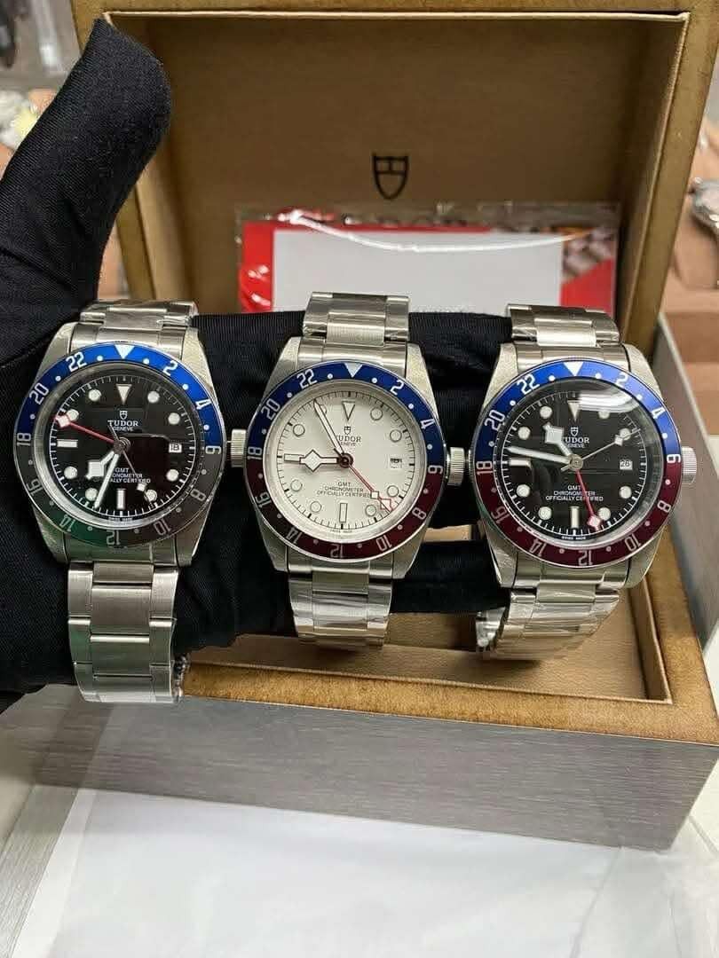 Tudor Rep (Category: Luxury Watches) located in Manila. Submitted by kaneramos031818 (Listing ID 1434289831, Image 1). Description: Collection of Tudor Black Bay watches. Features various dial and bezel colors, including black, white, and red/blue GMT bezels. All watches have stainless steel bracelets. Some models have gold accents on the bezel and bracelet. Includes a variety of dial designs and color schemes..