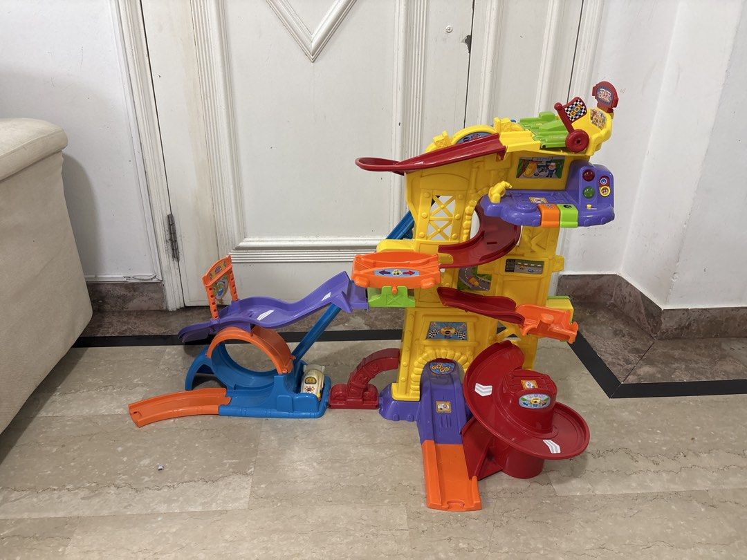 VTech Drivers (Category: Remote Control Toys) located in Singapore. Submitted by calmfire2323 (Listing ID 1434201658, Image 1). Description: - VTech Go! Go! Smart Wheels Ultimate RC Speedway - Interactive playset with multiple tracks and ramps - Includes all parts - Promotes imaginative play - Helps develop motor skills.