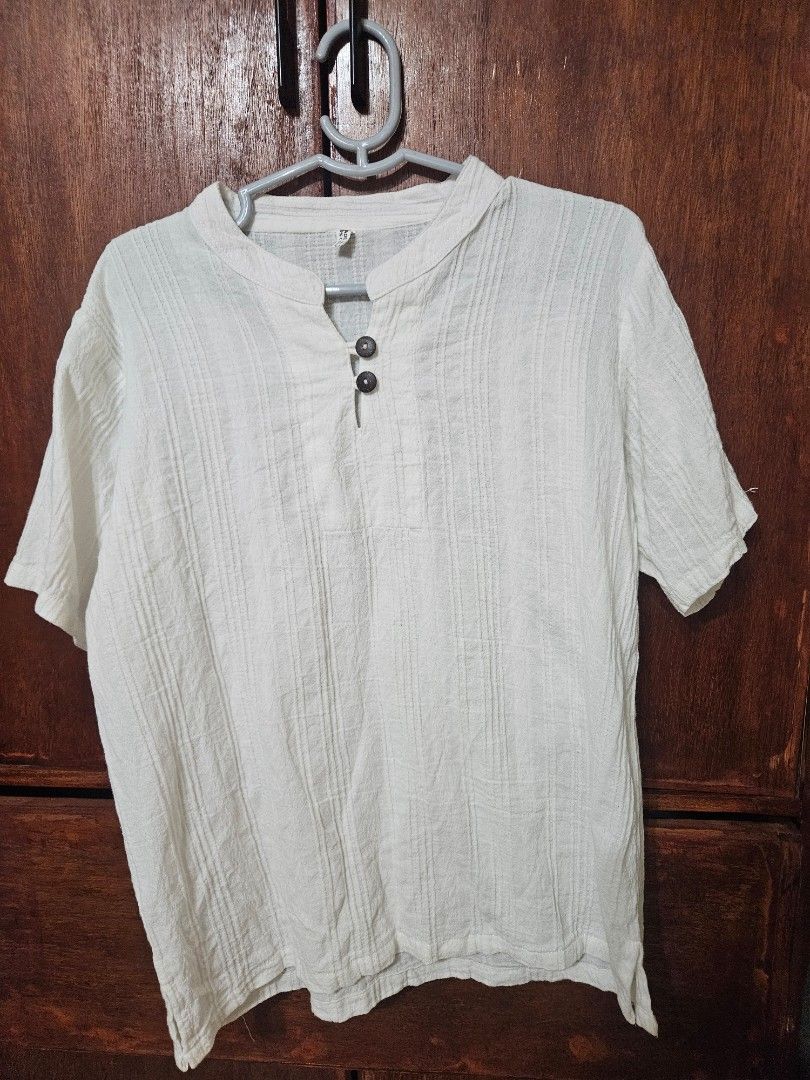 White cotton polo shirt (Category: Shirts) located in Mandaluyong City. Submitted by starcrazy (Listing ID 1434317668, Image 1). Description: - fits large to xl - from thailand - Lightweight and breathable fabric - 100% cotton striped pattern - unisex.