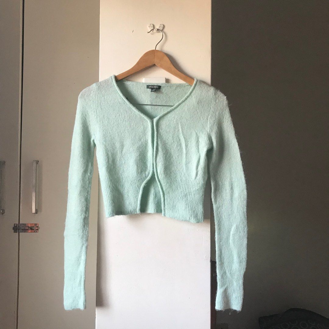 Wild Fable Cropped Cardigan (Category: Longsleeves) located in Marikina City. Submitted by altvxz (Listing ID 1434278898, Image 1). Description: - Wild Fable cropped cardigan - Soft, light green color - V-neckline - Long sleeves - Single button closure - Fuzzy knit material - rfs, di na nagagamit .