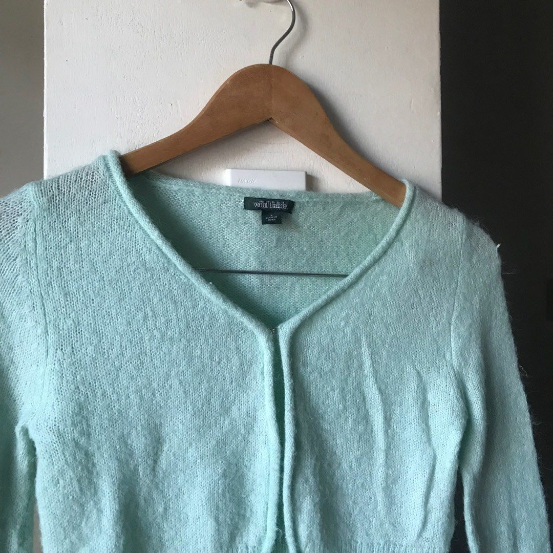 Wild Fable Cropped Cardigan (Category: Longsleeves) located in Marikina City. Submitted by altvxz (Listing ID 1434278898, Image 2). Description: - Wild Fable cropped cardigan - Soft, light green color - V-neckline - Long sleeves - Single button closure - Fuzzy knit material - rfs, di na nagagamit .