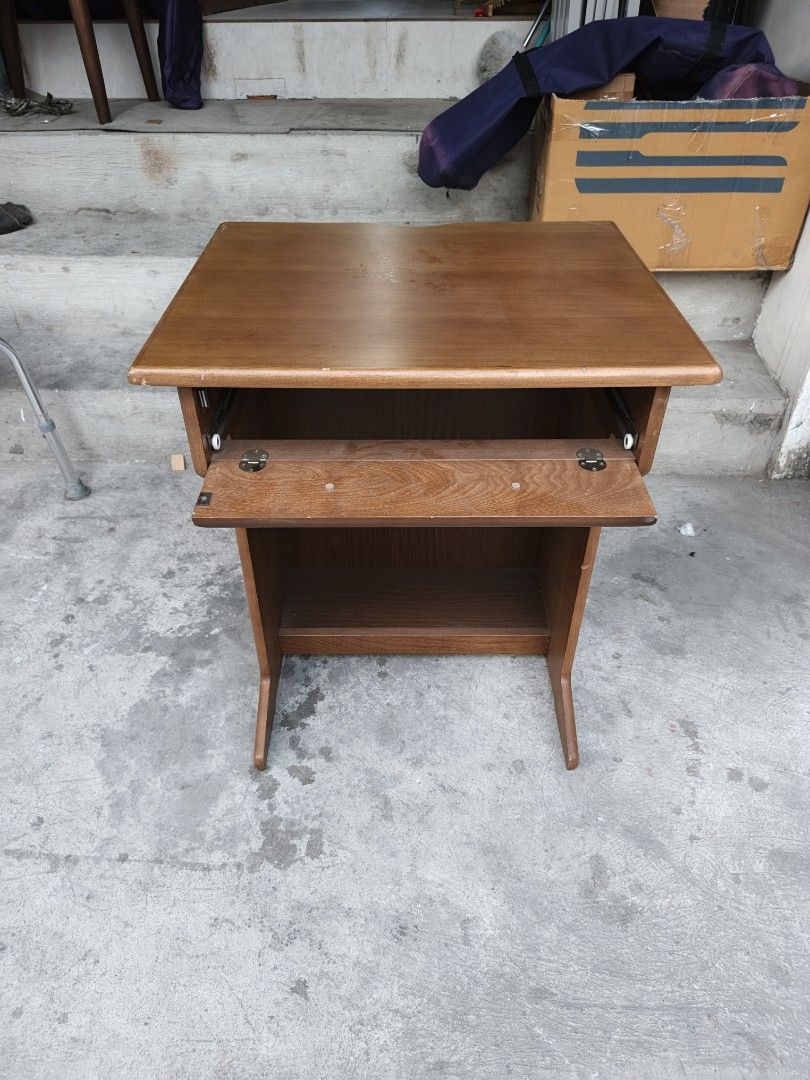 Wooden Side Table with Drawer (Category: Tables & Sets) located in Valenzuela. Submitted by kendra071914 (Listing ID 1434329846, Image 3). Description: - Wooden side table - Features a drawer and lower shelf - Warm brown finish - Dimensions: H-71cm, L-60cm, W-50cm - Perfect for bedside or small desk use - Classic aesthetic and practical storage.