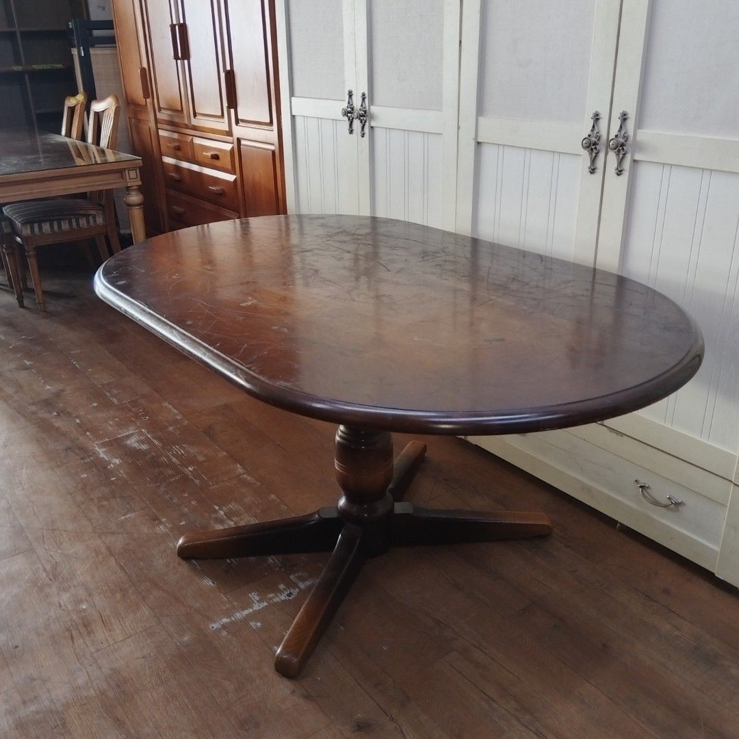 Woodpecker Oval Dining Table (Category: Tables & Sets) located in Manila. Submitted by ivan_furnitures421 (Listing ID 1434202399, Image 1). Description: - Oval dining table with a dark wood finish - Features a stylish pedestal base - Smooth, glossy surface - Dimensions: 1500mm (width) x 900mm (depth) x 700mm (height) - Made by Woodpecker Mark, Hida Industries Co., Ltd..