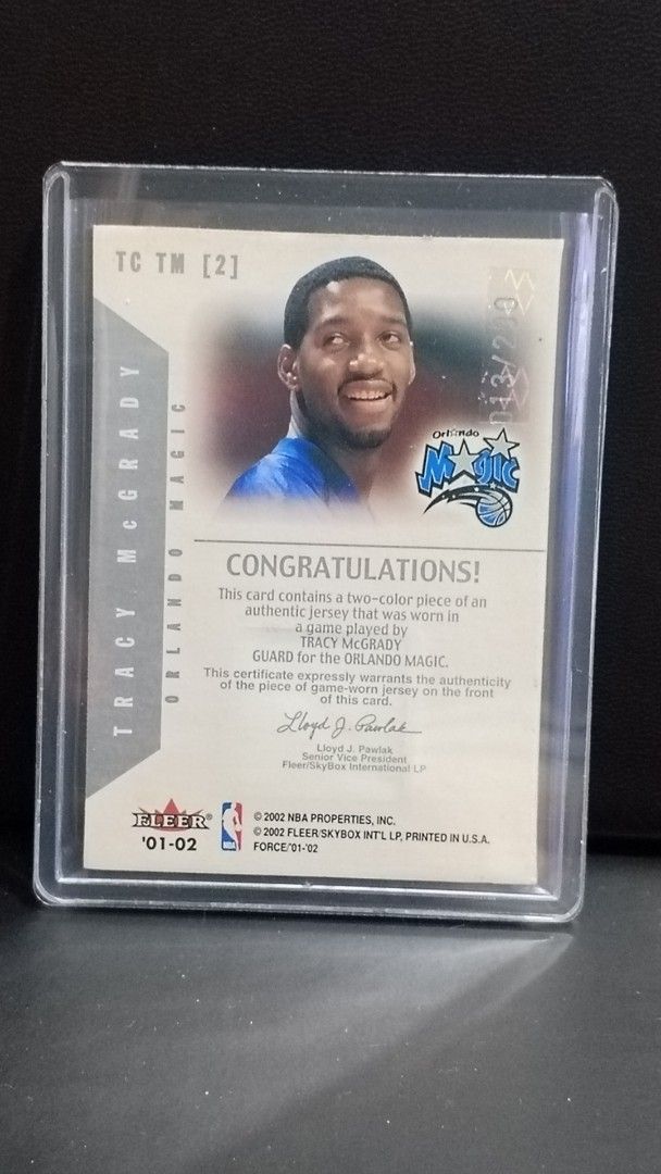 2001 Fleer Force True Colors Tracy McGrady 2 Color (Category: Raw Singles) located in Paranaque City. Submitted by limitedrun (Listing ID 1434461260, Image 2). Description: Condition: Near Mint Item Location: Parañaque City numbered to /200 PAYMENT: •Bank deposit - BPI, GCash,Maya, GoTyme SHIPPING: •LBC, Grab Express, Lalamove (buyer shoulders shipping fee).