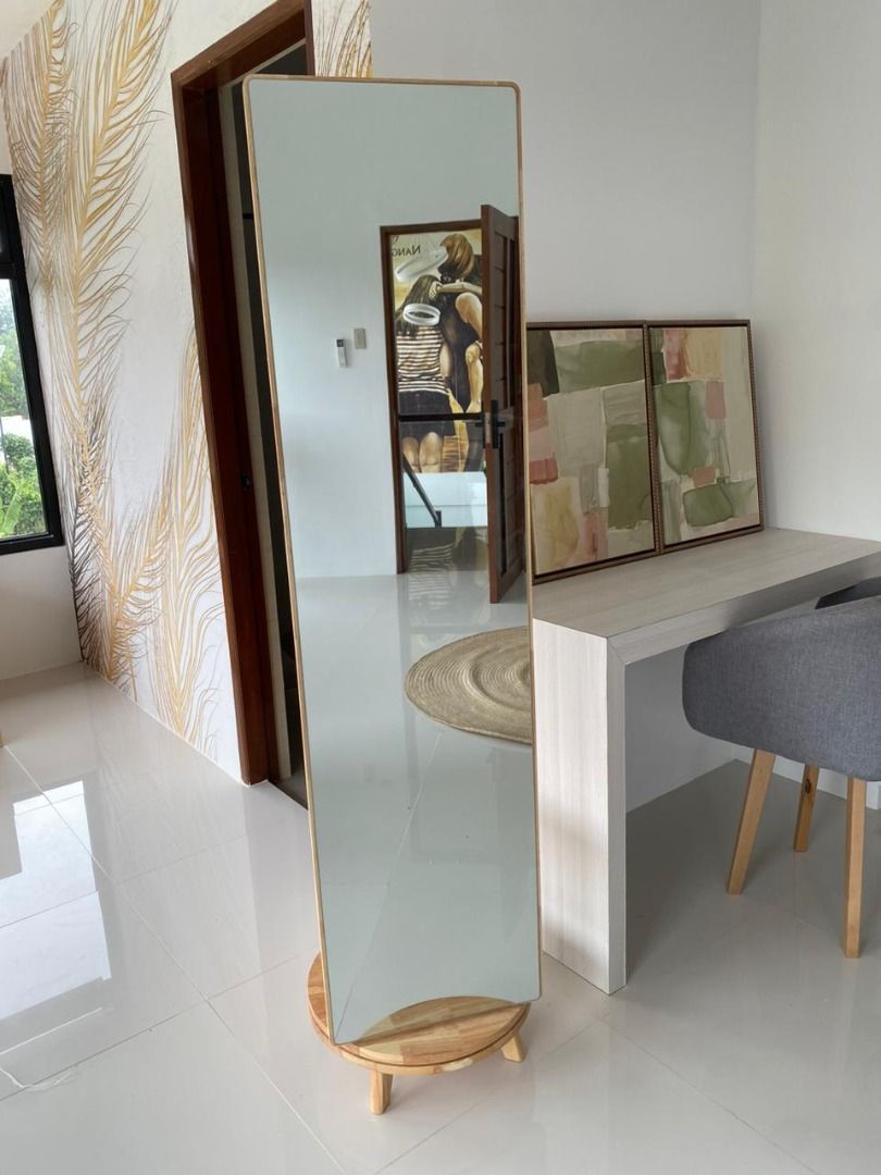 360 Rotating Wooden Standing Mirror with Hanger (Category: Mirrors) located in Caloocan City. Submitted by lyyyzzzz (Listing ID 1434555277, Image 3). Description: - Made in Solid Thailand Rubberwood - Treated and termite free - Full-length wooden standing mirror - Features a shelf for storage - Includes a built-in hanger for clothes, hats, and bags - Stable circular base - Ideal for bedrooms or entryways - Minimalist and functional design.