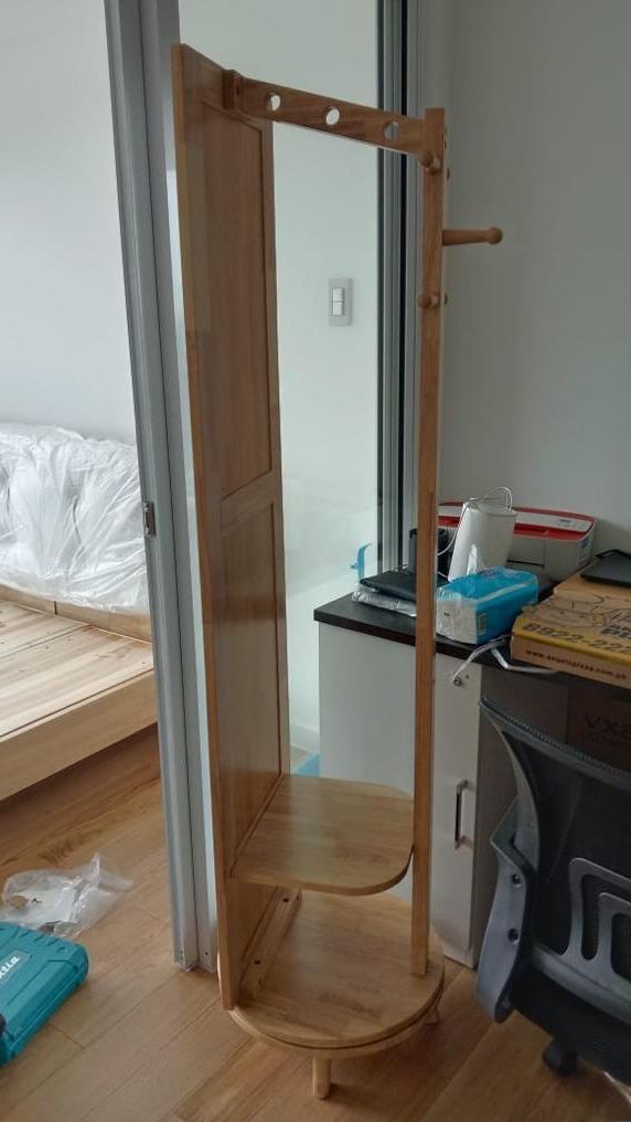 360 Rotating Wooden Standing Mirror with Hanger (Category: Mirrors) located in Caloocan City. Submitted by lyyyzzzz (Listing ID 1434555277, Image 2). Description: - Made in Solid Thailand Rubberwood - Treated and termite free - Full-length wooden standing mirror - Features a shelf for storage - Includes a built-in hanger for clothes, hats, and bags - Stable circular base - Ideal for bedrooms or entryways - Minimalist and functional design.