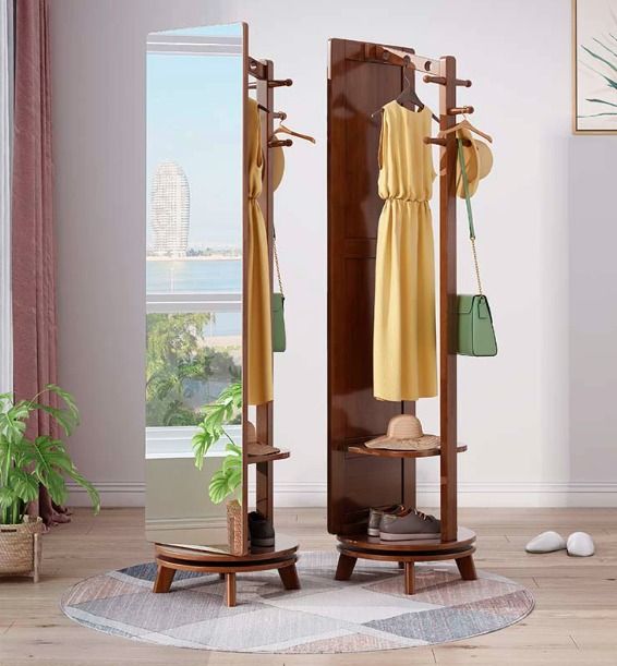 360 Rotating Wooden Standing Mirror with Hanger (Category: Mirrors) located in Caloocan City. Submitted by lyyyzzzz (Listing ID 1434555277, Image 1). Description: - Made in Solid Thailand Rubberwood - Treated and termite free - Full-length wooden standing mirror - Features a shelf for storage - Includes a built-in hanger for clothes, hats, and bags - Stable circular base - Ideal for bedrooms or entryways - Minimalist and functional design.