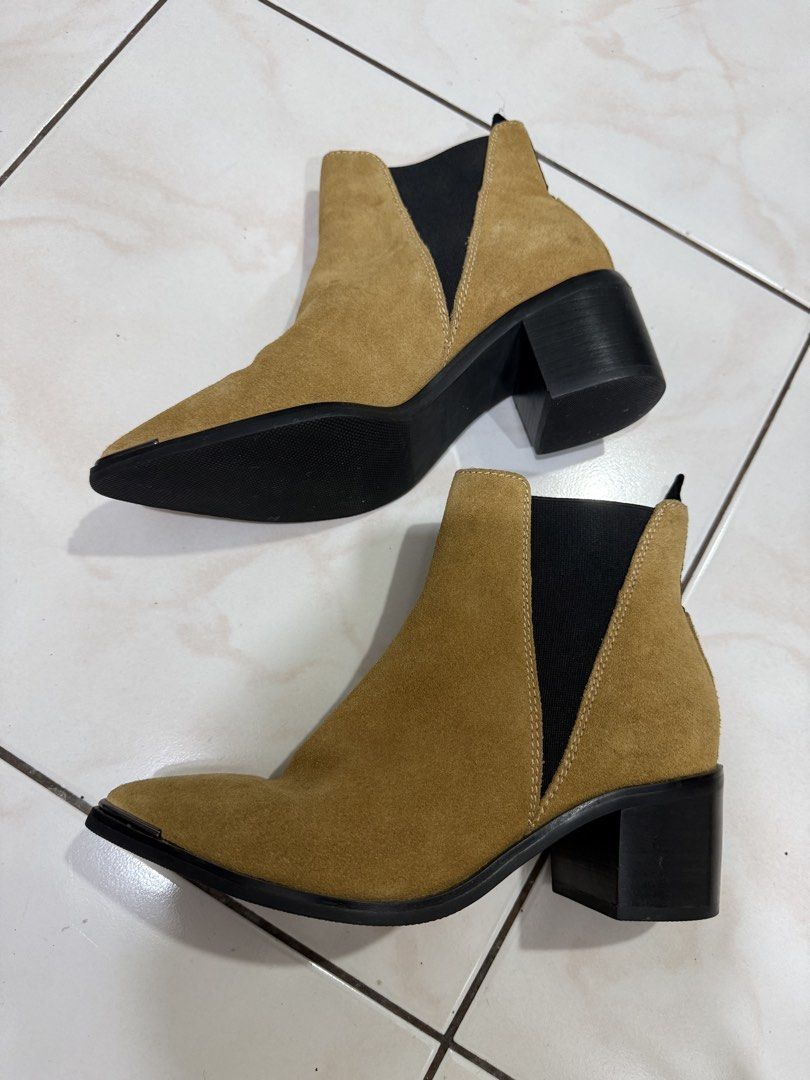 Acne Studios Pointed Toe Suede Ankle Boots (Category: Boots) located in Makati City. Submitted by bibas.corner (Listing ID 1434554016, Image 2). Description: - Acne Studios ankle boots - Tan suede - Size 37 - Made in Italy - Pointed toe with metal detailing - Elastic side panels - Block heel - Leather upper - Man-made sole.