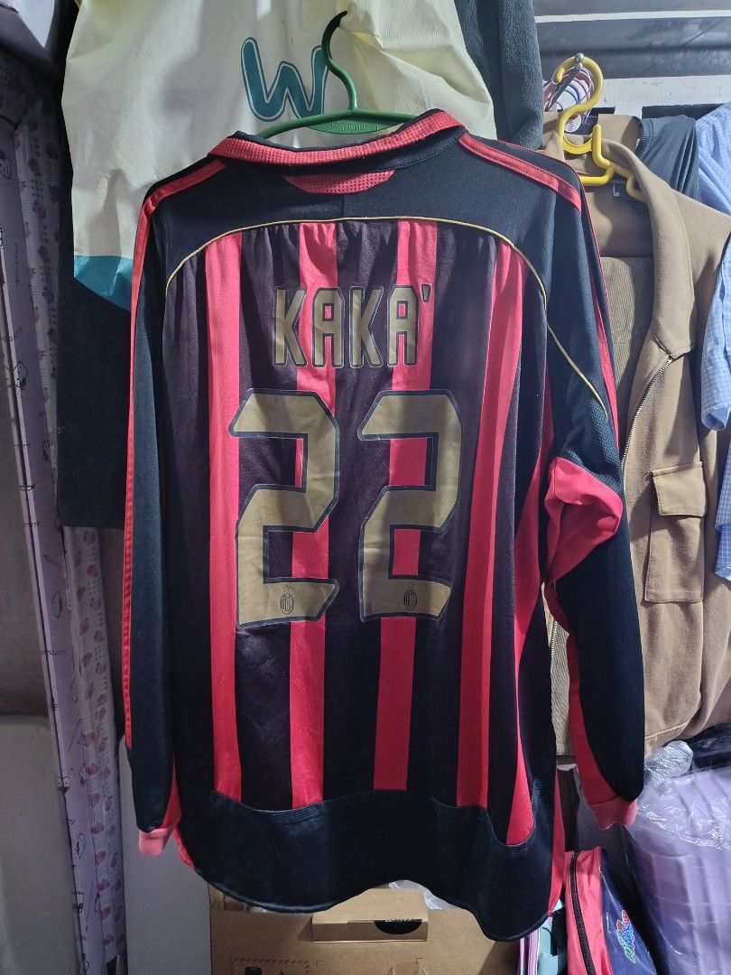 Adidas AC Milan Kaka Jersey (Category: Activewear) located in Silang. Submitted by kits.etcv2 (Listing ID 1434525622, Image 2). Description: - Authentic AC Milan jersey - Features Kaka's name and number 22 - Classic black and red striped design - Long-sleeved - Includes bwin sponsor logo - Adidas logo present.