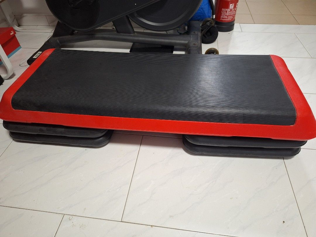 Adjustable Step Platform (Category: Cardio & Fitness Machines) located in Singapore. Submitted by vinciz (Listing ID 1434495125, Image 1). Description: - Adjustable step platform - Includes two sets of risers for height adjustment - Non-slip surface - Ideal for home workouts and fitness routines - 34.5 inches in lenght actual stepboard, excluding vase support.
