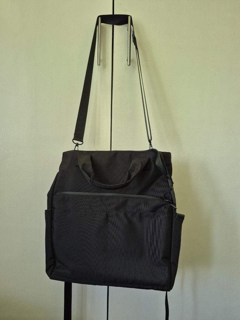 Anello 3-Way Bag (Category: Shoulder Bags) located in Valenzuela. Submitted by pappx (Listing ID 1434439844, Image 1). Description: - Anello 3 way bag - Sleek black design - Multiple compartments and pockets for organization - Top handle and detachable shoulder strap - Water-resistant material - Fits a 13-inch laptop - Zipper closure - 10 pockets.
