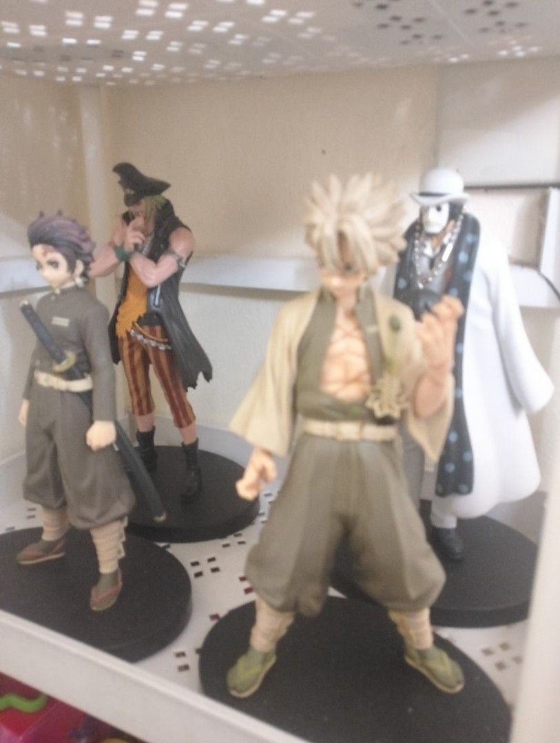 Anime Figures Set (Category: Figurines & Statues) located in Manila. Submitted by happyshark-5879 (Listing ID 1434531514, Image 1). Description: - Anime figure set featuring multiple characters. - Includes figures of: - Spiky blonde hair character - Character in a black coat - Character with a sword - Character in a white coat - Each figure comes with a black base. - Ideal for anime fans and collectors..