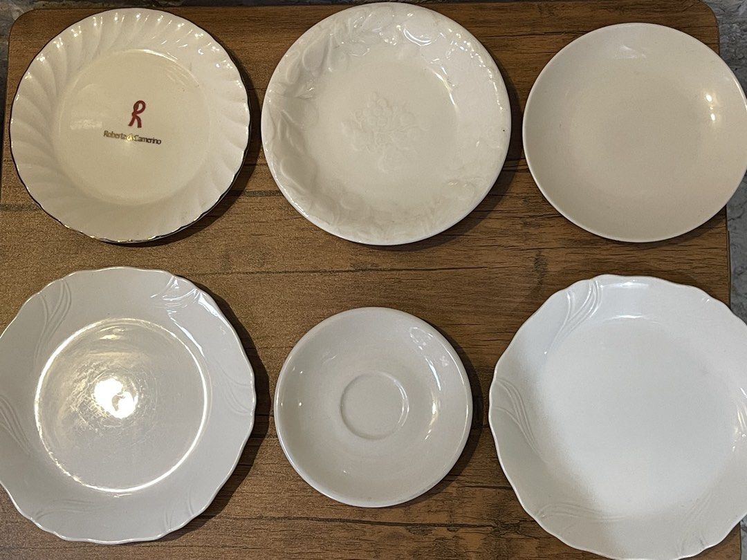 Assorted Plates - Nitto, Lancel, Hoya, Roberta di Camerino (Category: Dinnerware & Cutlery) located in San Fernando. Submitted by japansurpluselyu (Listing ID 1434585261, Image 1). Description: - Assorted plates from Nitto, Lancel, Hoya, and Roberta di Camerino. - Includes various sizes and designs. - Perfect for serving or display. - Made in Japan and China. - Features floral and geometric patterns. - Ideal addition to any kitchen or dining coll