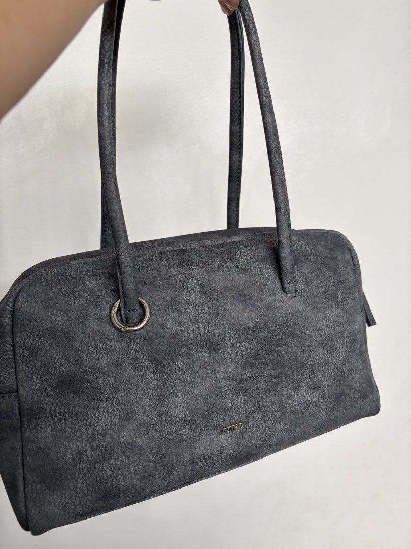 Astrid Medium Boston bag (Category: Luxury Bags & Wallets) located in Rizal. Submitted by katmandulovesmakeup (Listing ID 1434448252, Image 1). Description: Astrid Medium Boston bag with silver ring fir bag charm No box Silver hardware Twice used Rfs: Decluterring.