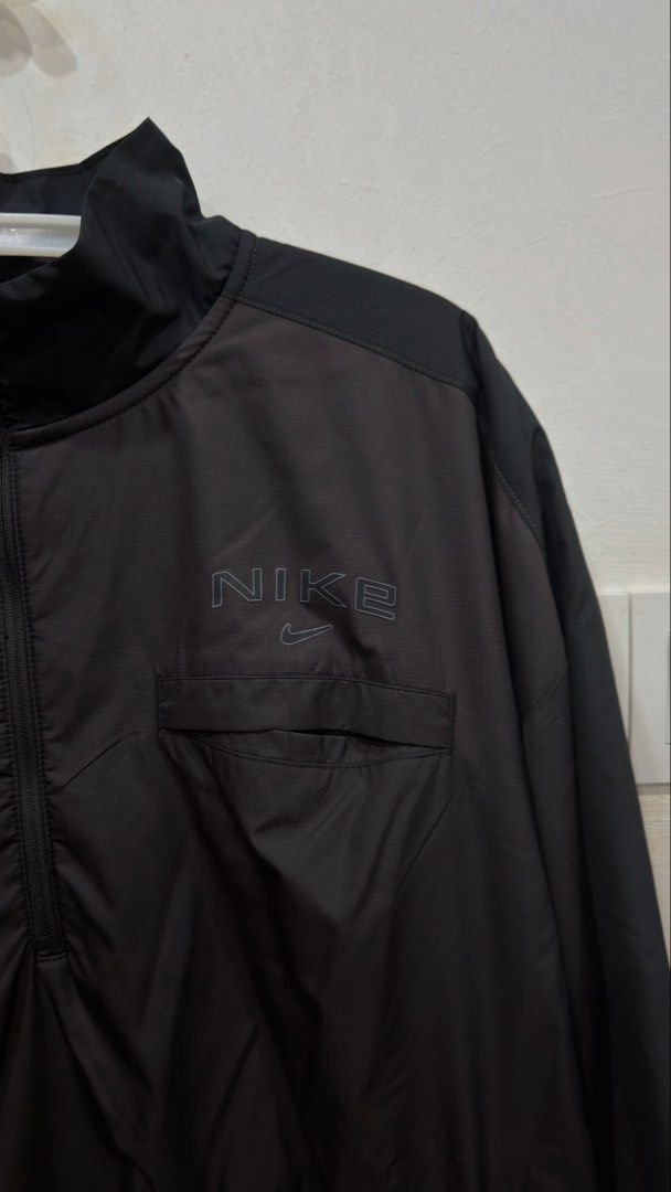 Authentic Nike Pullover Jacket (Category: Coats, Jackets and Outerwear) located in Shah Alam. Submitted by youneedthemgetthem (Listing ID 1434494393, Image 2). Description: - Black Nike half-zip pullover jacket - Size: XL - Features a front pocket - Nike logo on chest Worn once only, bought this at Japan..