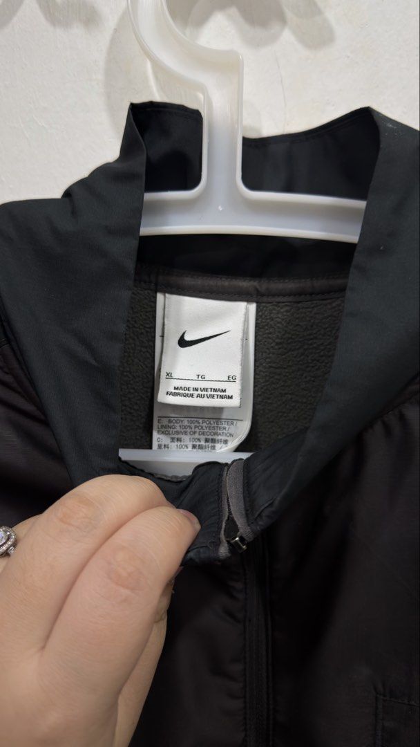 Authentic Nike Pullover Jacket (Category: Coats, Jackets and Outerwear) located in Shah Alam. Submitted by youneedthemgetthem (Listing ID 1434494393, Image 3). Description: - Black Nike half-zip pullover jacket - Size: XL - Features a front pocket - Nike logo on chest Worn once only, bought this at Japan..