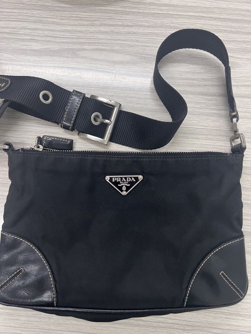 Authentic Prada Tessuto Nylon Baguette Bag (Category: Luxury Bags & Wallets) located in Cagayan de Oro. Submitted by riggstuffs (Listing ID 1434461440, Image 3). Description: ➡️ Guaranteed Authentic Prada Tessuto Baguette bag ➡️ With white tag ➡️ Made in Italy ➡️ Nylon material with leather trimmings ➡️ Minimal signs of use at the interior material ➡️ no other inclusion ➡️ Dimension: H6”x W 9”, sling drop 6” Disclaimer : Riggstuffs is not associa