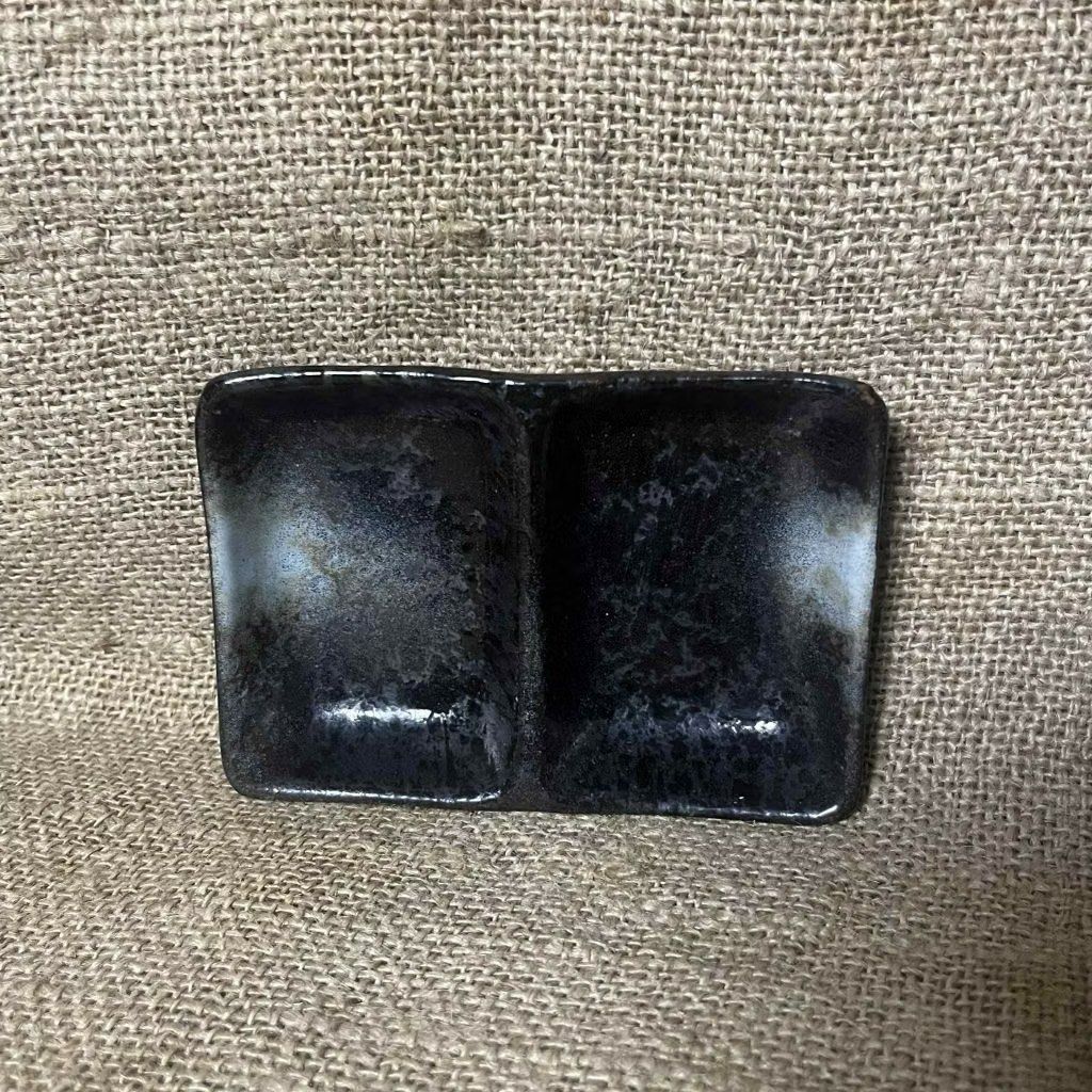 Black Ceramic Dual Compartment Dipping Dish (Category: Other Kitchenware & Tableware) located in Bulacan. Submitted by ceramicscubby (Listing ID 1434502582, Image 3). Description: Size: 5 L x 3.5 W in. ❗️CLOSING DOWN SALE, ALL PRICES ARE MARKED DOWN. WE WILL NOT BE ACCEPTING OFFERS LOWER THAN OUR ASKING PRICE. ❗️ - Set of black ceramic double dipping dishes - Each dish has two compartments - Ideal for sauces, dips, or snacks - Unique textured fin