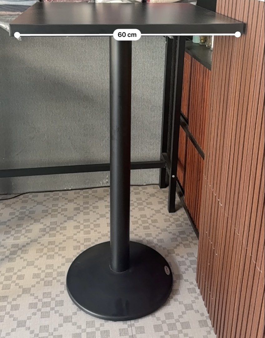 Black Square Bar Table ( high table ) (Category: Tables & Sets) located in Quezon City. Submitted by shejyy (Listing ID 1434456109, Image 3). Description: - High table Black square bar table - Features a sturdy round base - 60cm tabletop - 1.57 meters tall - Simple, modern design - Ideal for cafes, bars, or home use.