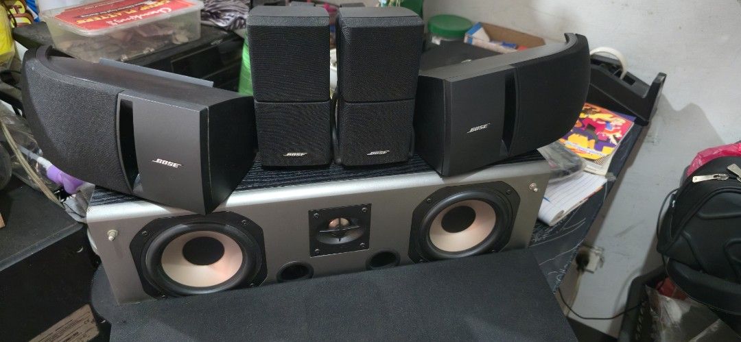 Bose Speaker System (Category: Soundbars, Speakers & Amplifiers) located in Marilao. Submitted by ndzamora77 (Listing ID 1434560793, Image 1). Description: - Bose speaker system - Includes center, front, and rear speakers - Center speaker: silver finish - Front and rear speakers: black - In good working condition - Ideal for home theater and music.