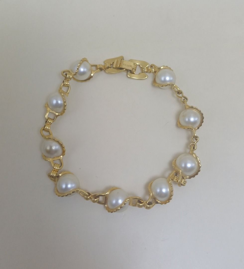 Bracelet 587 (GIOIELLI) (Category: Bracelets) located in Cebu City. Submitted by tea_pr (Listing ID 1434406584, Image 2). Description: 1 pc. available Very minor scratches on some pearl-like beads and lock/clasp Length (unclasped): 20 cm (approx.) RFS: Decluttering Delivery/shipping fee to be shouldered by buyer. Modes of payment: Gcash, PayPal, or online bank transfer.