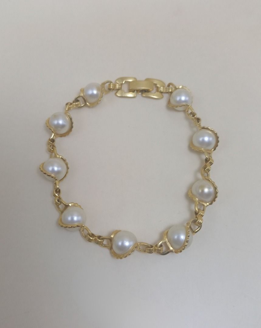 Bracelet 587 (GIOIELLI) (Category: Bracelets) located in Cebu City. Submitted by tea_pr (Listing ID 1434406584, Image 1). Description: 1 pc. available Very minor scratches on some pearl-like beads and lock/clasp Length (unclasped): 20 cm (approx.) RFS: Decluttering Delivery/shipping fee to be shouldered by buyer. Modes of payment: Gcash, PayPal, or online bank transfer.