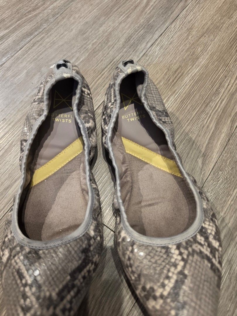 Butterflies Twists Snake Print Ballet Flats (Category: Flats & Sandals) located in Makati City. Submitted by everydaytrinkets (Listing ID 1434521509, Image 3). Description: - Butterflies Twists ballet flats - Unique snake print design - Comfortable interior with yellow accent - Foldable for easy storage and portability - Light grey soles.