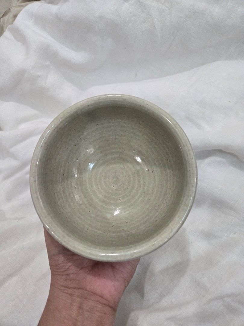 Ceramic Bowl (Light green) (Category: Other Kitchenware & Tableware) located in Manila. Submitted by asdfghjklaine07 (Listing ID 1434470037, Image 2). Description: - Light green ceramic bowl - Textured interior - Rounded shape with slightly flared rim - Can be used as a matcha whisk bowl.