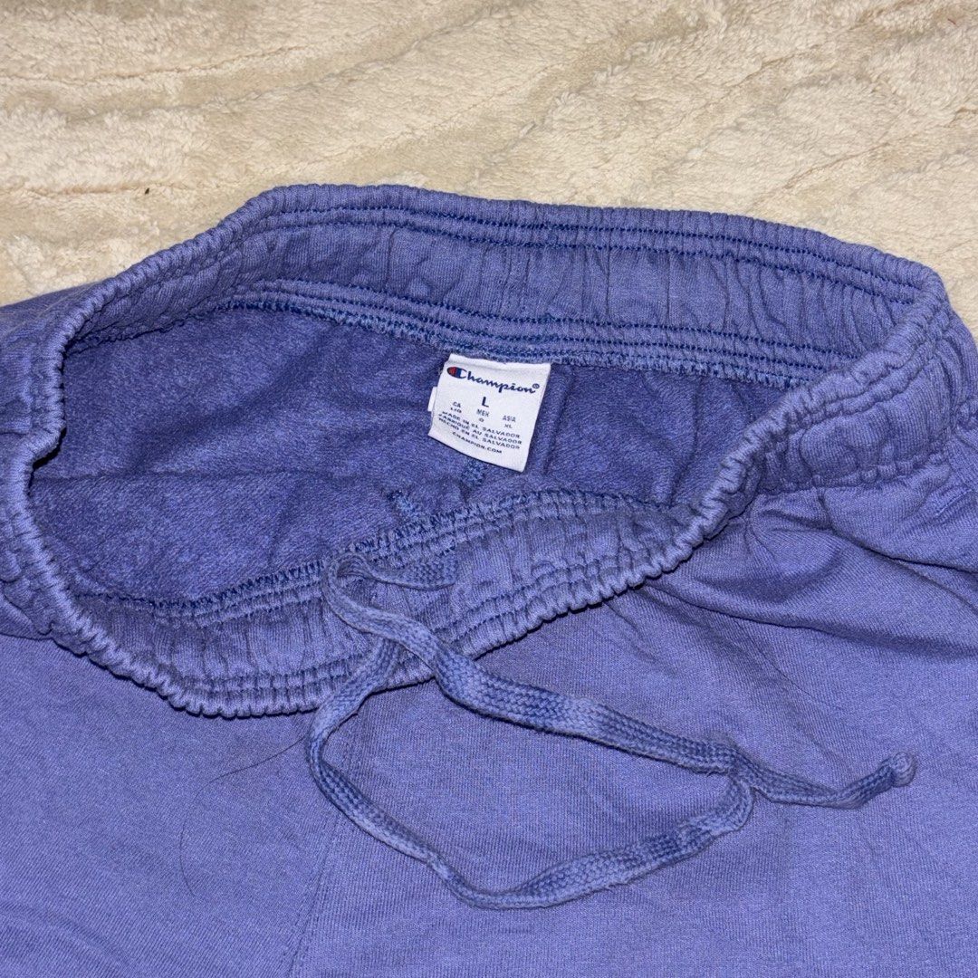 Champion Lavender Cotton Shorts (Category: Shorts) located in Quezon City. Submitted by grailph (Listing ID 1434558588, Image 3). Description: - Champion lavender shorts - Authentic - Size: L on tag - 29-34 waistline - 21.5” Length - Champion logo and graphic on left leg - Elastic waistband with drawstring - Two side pockets Issue last pic not sure san ako nasabit kindly check the last photo Minor discoloration sa drawstring (unnoticeable) 300+sf