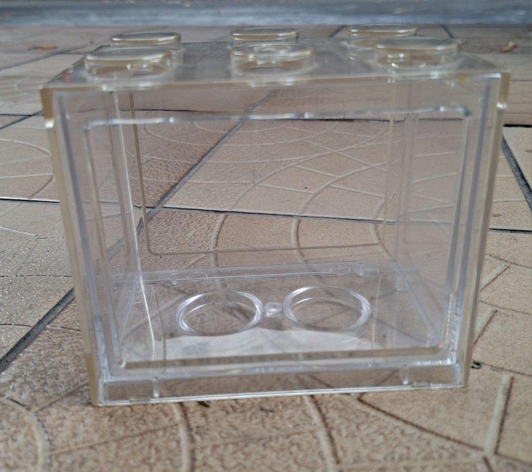 Clear Acrylic Betta Fish Tank (Category: Homes & Other Pet Accessories) located in Quezon City. Submitted by koloshop (Listing ID 1434488724, Image 1). Description: - Clear acrylic betta fish tank - 12x8x11 cm - Removable top - Perfect for a single betta fish - With single white LED light (cr2032 batteries not included).