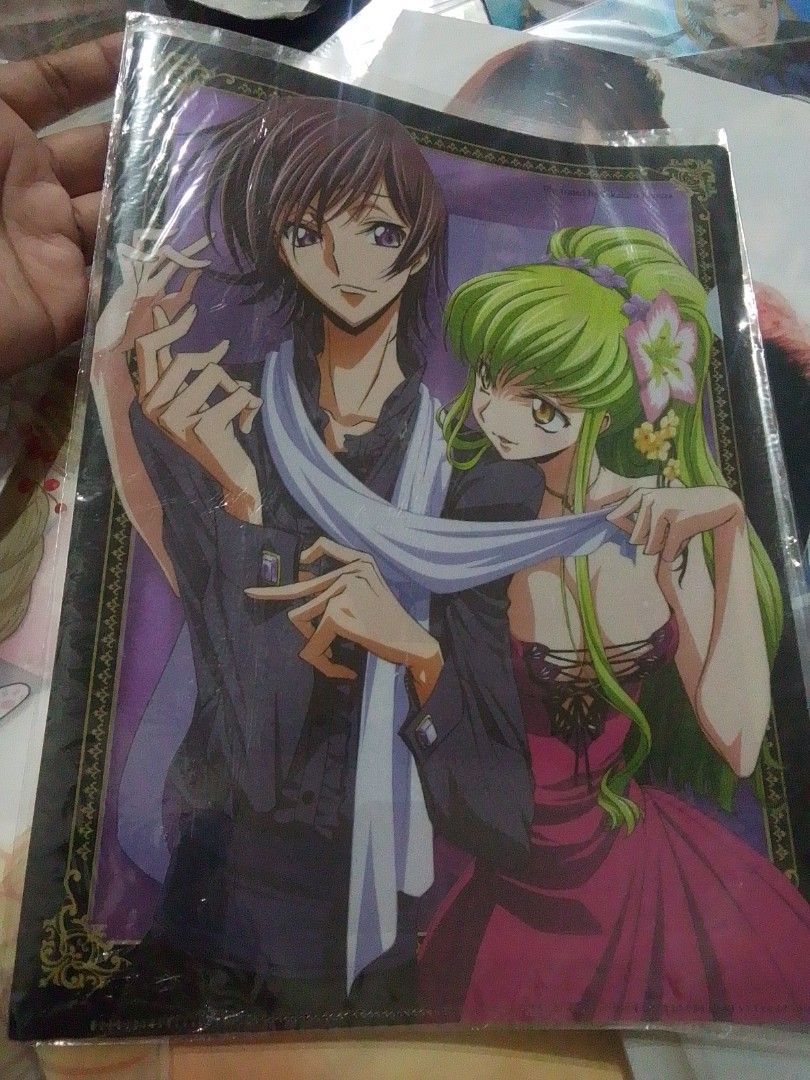 Code Geass Lelouch and C.C. Poster (Category: Art & Prints) located in Santa Rosa. Submitted by animemerchcollection (Listing ID 1434537419, Image 1). Description: - Code Geass poster featuring Lelouch and C.C. - Romantic pose artwork. - Sealed in plastic for protection. - Purple background with decorative border. - Perfect for Code Geass fans and collectors..