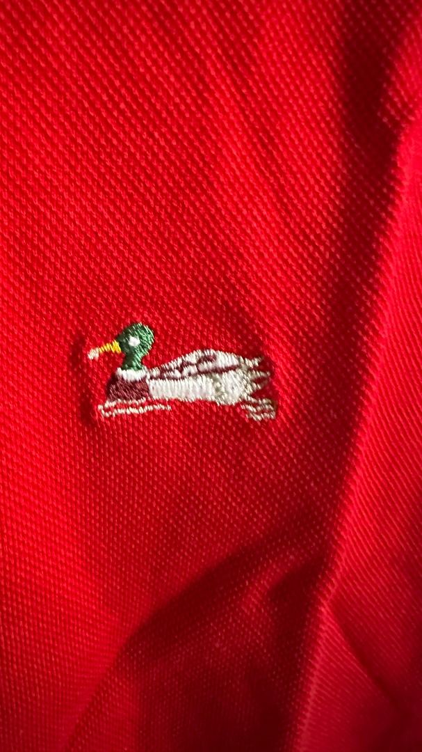 Ducks Unlimited Two-Tone Poli (Category: Tshirts & Polo Shirts ) located in Manila. Submitted by neilmatthewlua (Listing ID 1434436981, Image 3). Description: Sobrang tingkad pa ng kulay! Selling this Ducks Unlimited Red Polo with White Collar. Bagay na bagay sa mga mahilig sa sporty or varsity look. Very clean and professional tignan. Condition: 9/10 (Very Good Condition). Vibrant red color, hindi kupas. Puti pa rin ang collar, walang yellow sta
