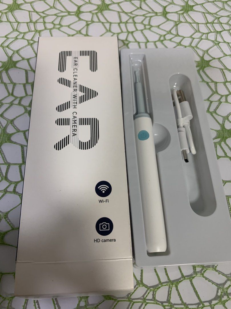 Ear Cleaner with Camera FB-white (Category: Cleaning Tools & Supplies) located in Makati City. Submitted by newandlovedco. (Listing ID 1434583340, Image 2). Description: Ear cleaner features a built-in HD camera and Wi-Fi connectivity. The package includes the ear cleaner itself and a charging cable..