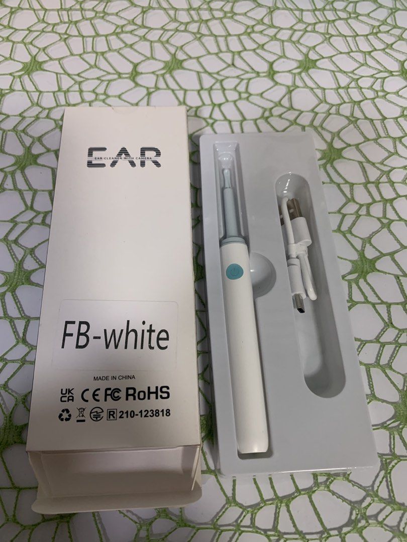 Ear Cleaner with Camera FB-white (Category: Cleaning Tools & Supplies) located in Makati City. Submitted by newandlovedco. (Listing ID 1434583340, Image 1). Description: Ear cleaner features a built-in HD camera and Wi-Fi connectivity. The package includes the ear cleaner itself and a charging cable..