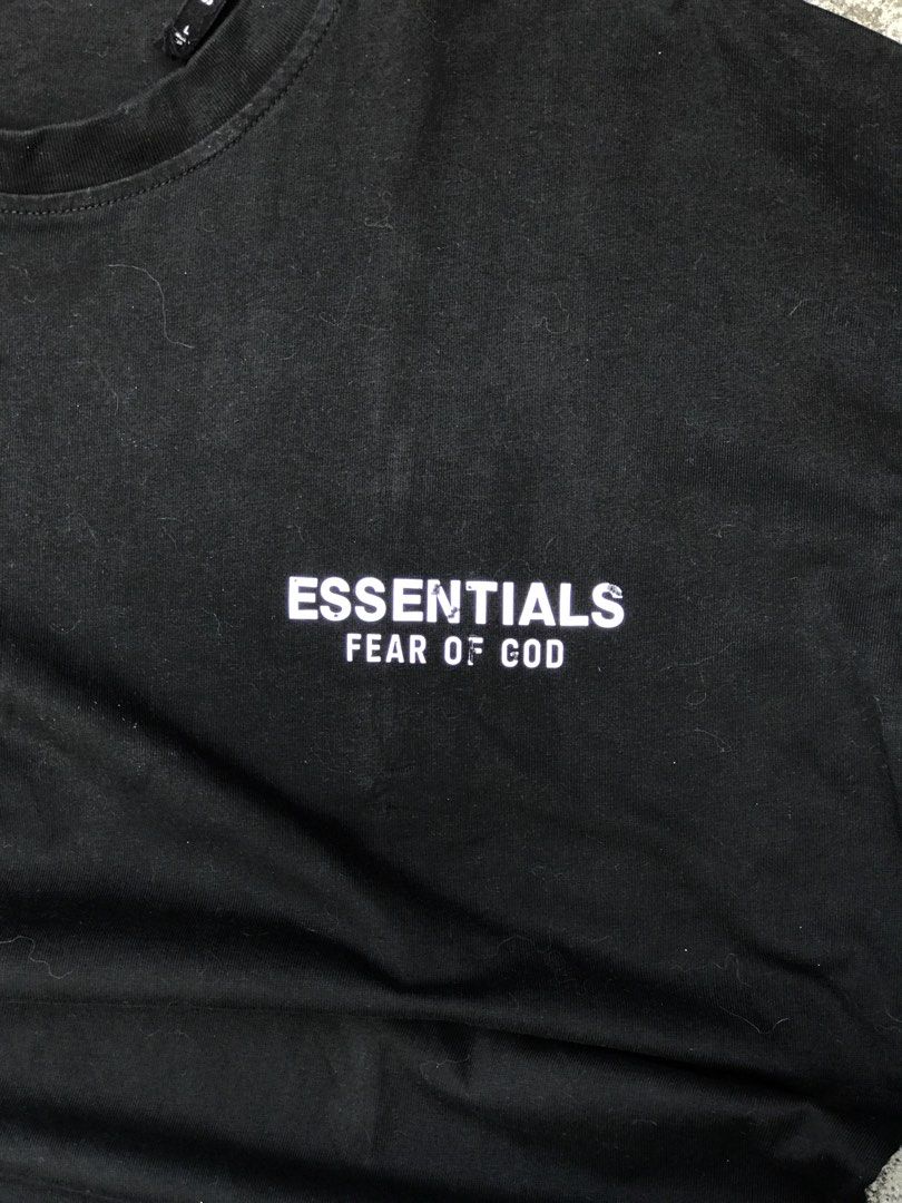 Essentials Fear of God Black T-shirt (Category: Tshirts & Polo Shirts ) located in Caloocan City. Submitted by srdnkrk_0 (Listing ID 1434480399, Image 1). Description: - Fear of God Essentials T-shirt - Black color - Features the Essentials logo on the front - Crew neck style - Made of cotton material - Brand new with tag -dimes 21x28.